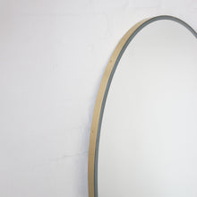 Ovalis™ Oval shaped Front Illuminated Modern Large Mirror with a Brushed Brass Frame