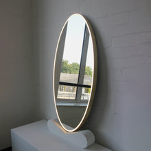 Ovalis™ Oval shaped Front Illuminated Modern Large Mirror with a Brushed Brass Frame