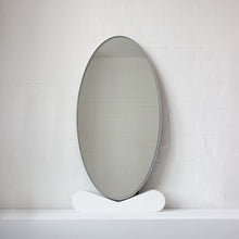Ovalis™ Oval shaped Front Illuminated Modern Large Mirror with a Brushed Brass Frame