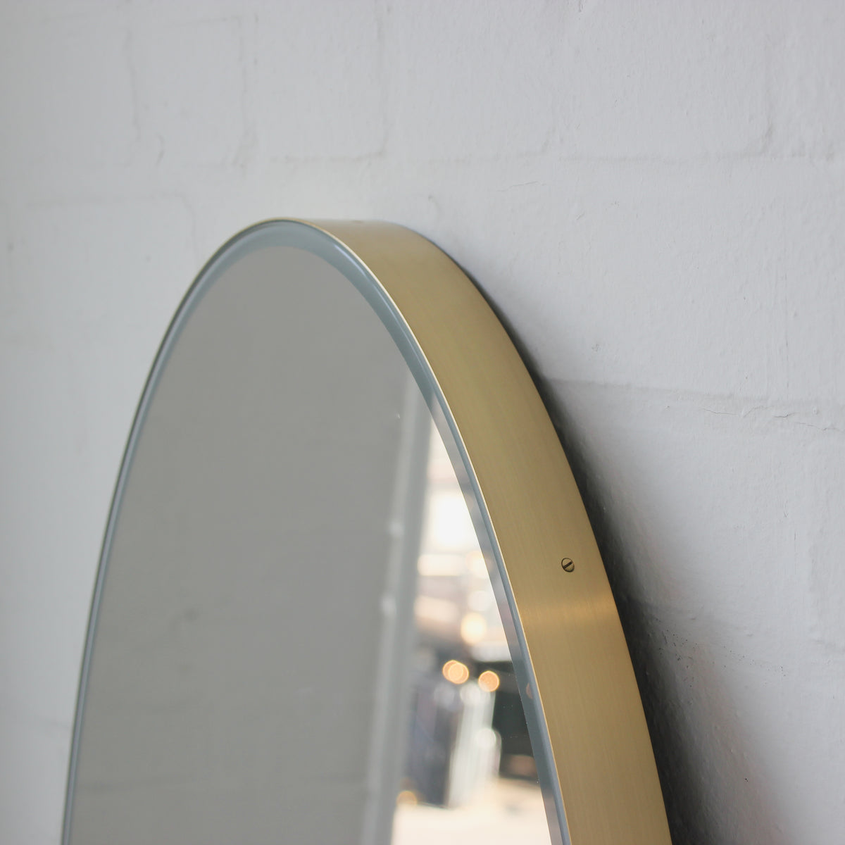 Ovalis™ Oval shaped Front Illuminated Modern Large Mirror with a Brushed Brass Frame