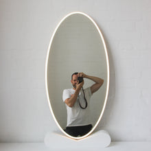 Ovalis™ Oval shaped Front Illuminated Modern Large Mirror with a Brushed Brass Frame