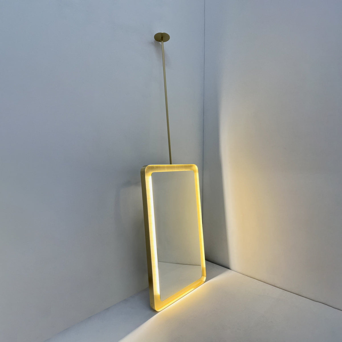 Ceiling Suspended Quadris™ Rectangular Illuminated Mirror with Brass Tray Frame
