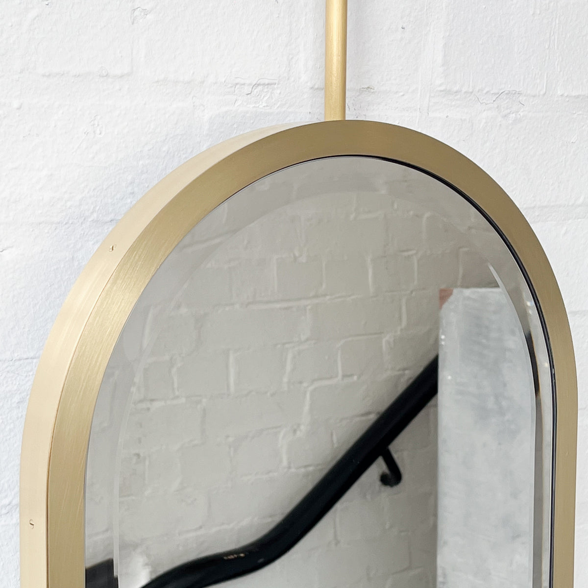 Pill shaped Ceiling Suspended Bevelled Mirror with Brass Full Frame