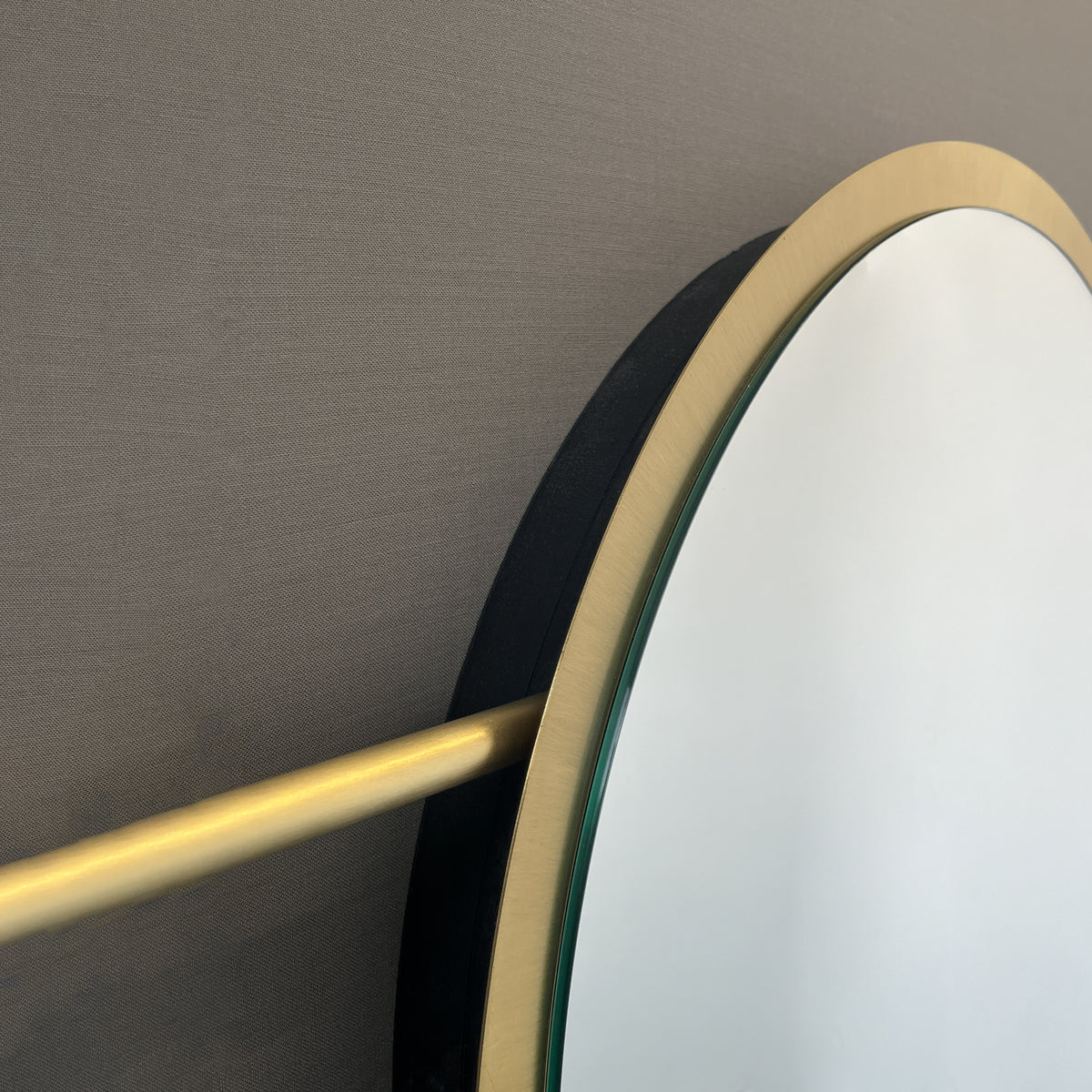 Wall-to-wall Orbis™ Contemporary Round Mirror with Architectural Tipo™ Brass Frame