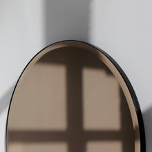 Orbis™ Bevelled Bronze Tinted Decorative Round Mirror with a Black Metal Frame