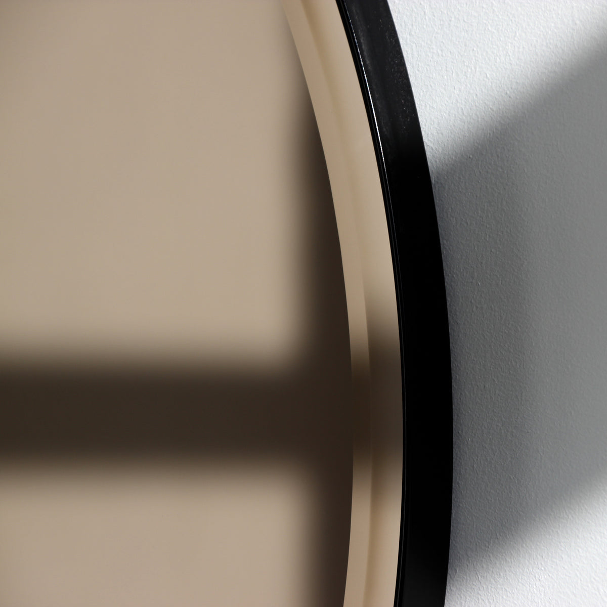 Orbis™ Bevelled Bronze Tinted Decorative Round Mirror with a Black Metal Frame
