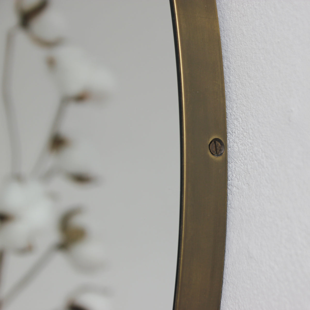 Orbis™ Round Mirror with a Minimalist Handcrafted Bronze Patina Frame