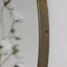 Orbis™ Round Mirror with a Minimalist Handcrafted Bronze Patina Frame