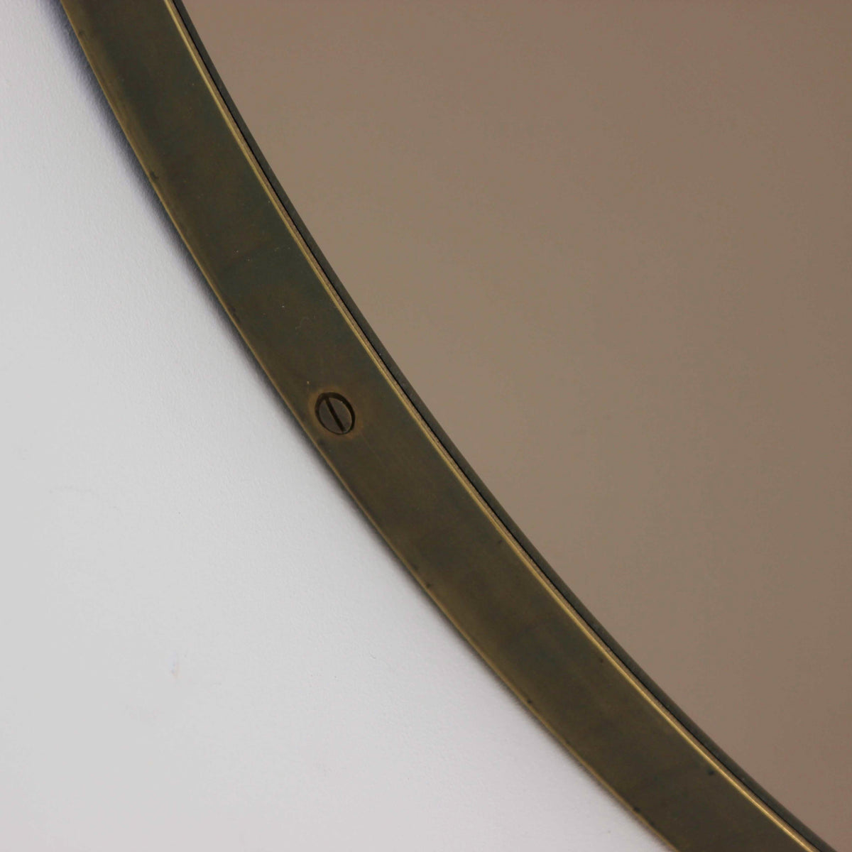 Orbis™ Bronze Tinted Round Contemporary Mirror with a Bronze Patina Brass Frame