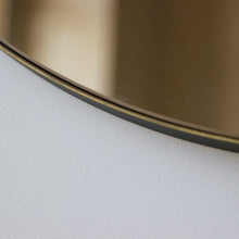 Orbis™ Bronze Tinted Round Contemporary Mirror with a Bronze Patina Brass Frame