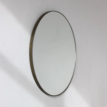 Orbis™ Round Mirror with a Minimalist Handcrafted Bronze Patina Frame