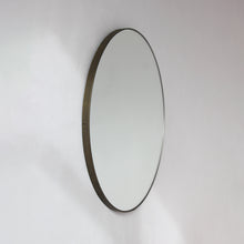 Orbis™ Round Mirror with a Minimalist Handcrafted Bronze Patina Frame