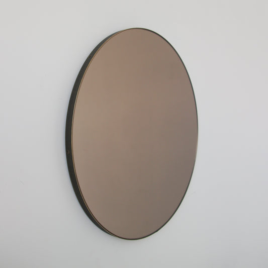 In Stock Orbis™ Bronze Tinted Round Contemporary Mirror with Bronze Patina Brass Frame