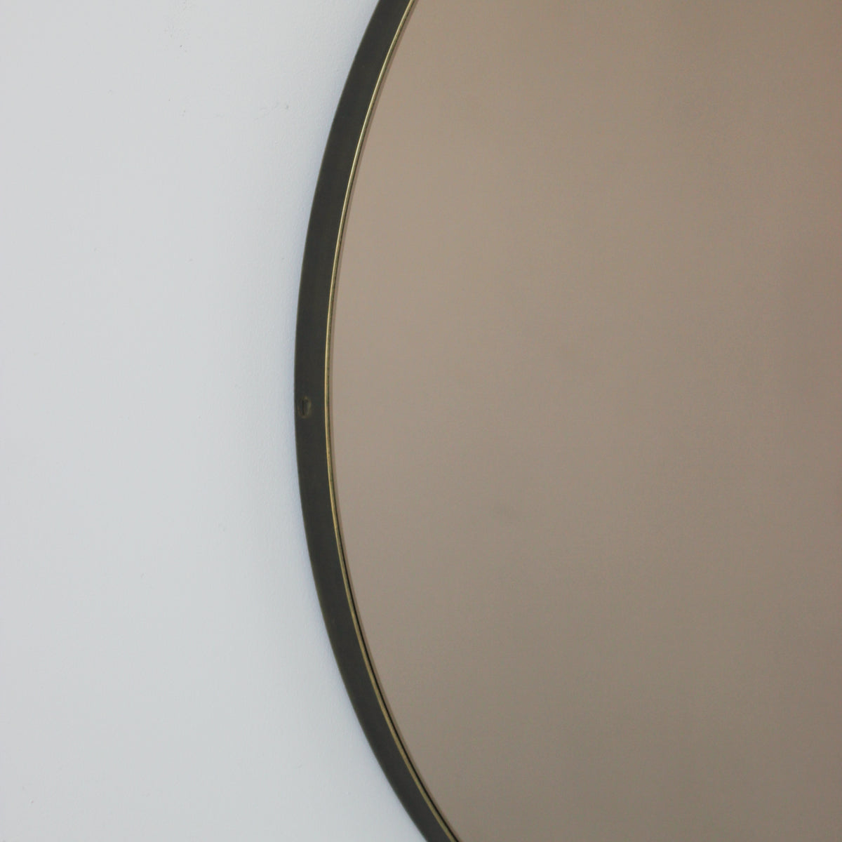 Orbis™ Bronze Tinted Round Contemporary Mirror with a Bronze Patina Brass Frame