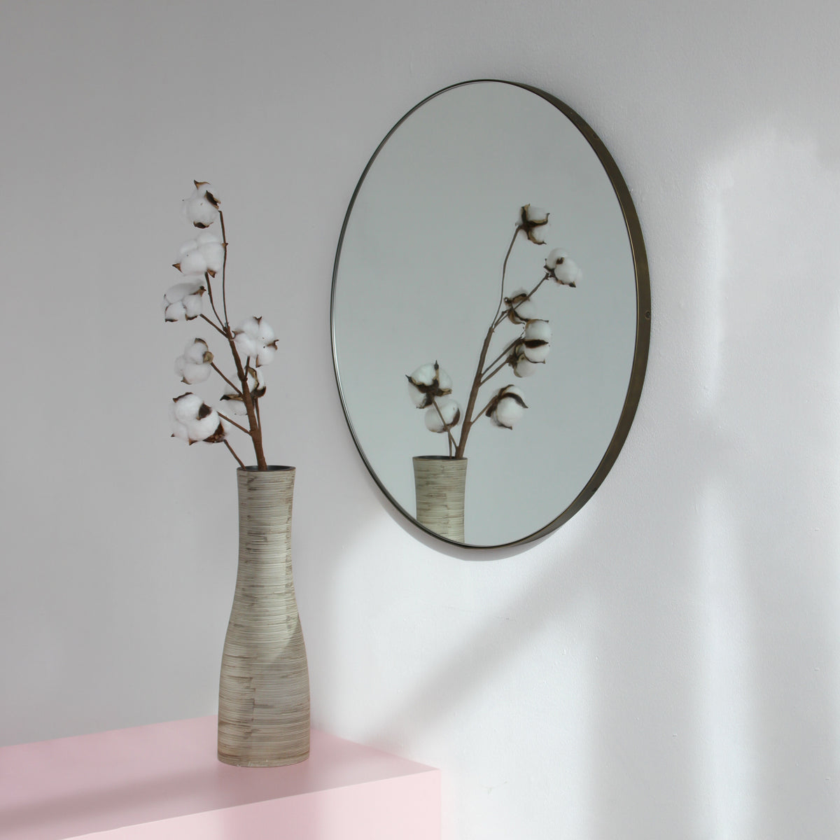 Orbis™ Round Mirror with a Minimalist Handcrafted Bronze Patina Frame