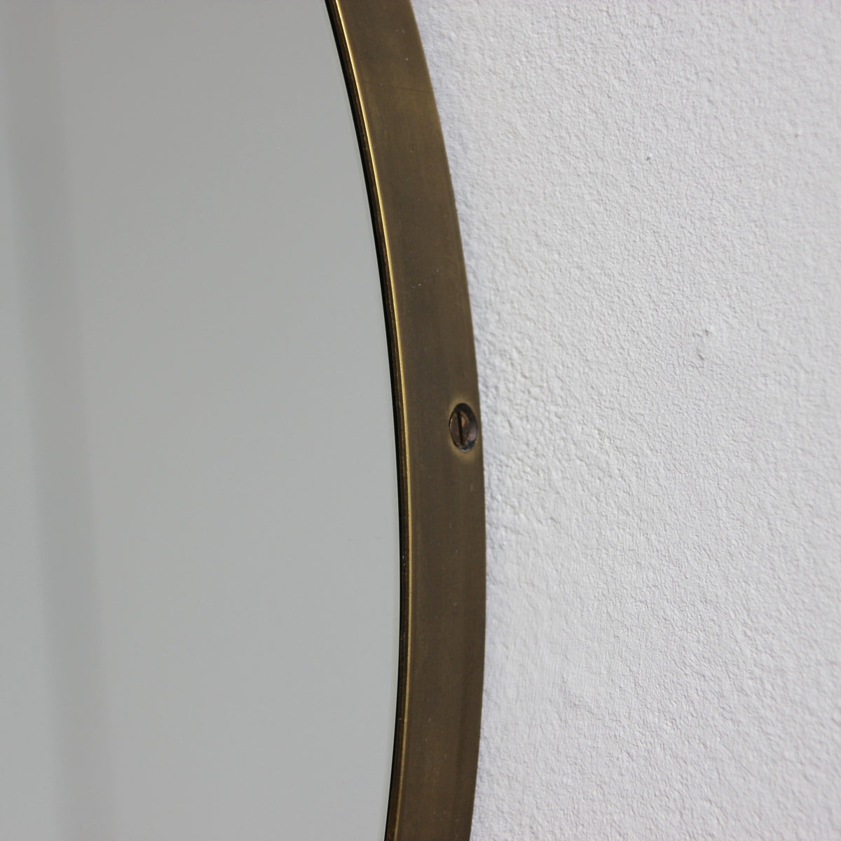 Orbis™ Round Mirror with a Minimalist Handcrafted Bronze Patina Frame