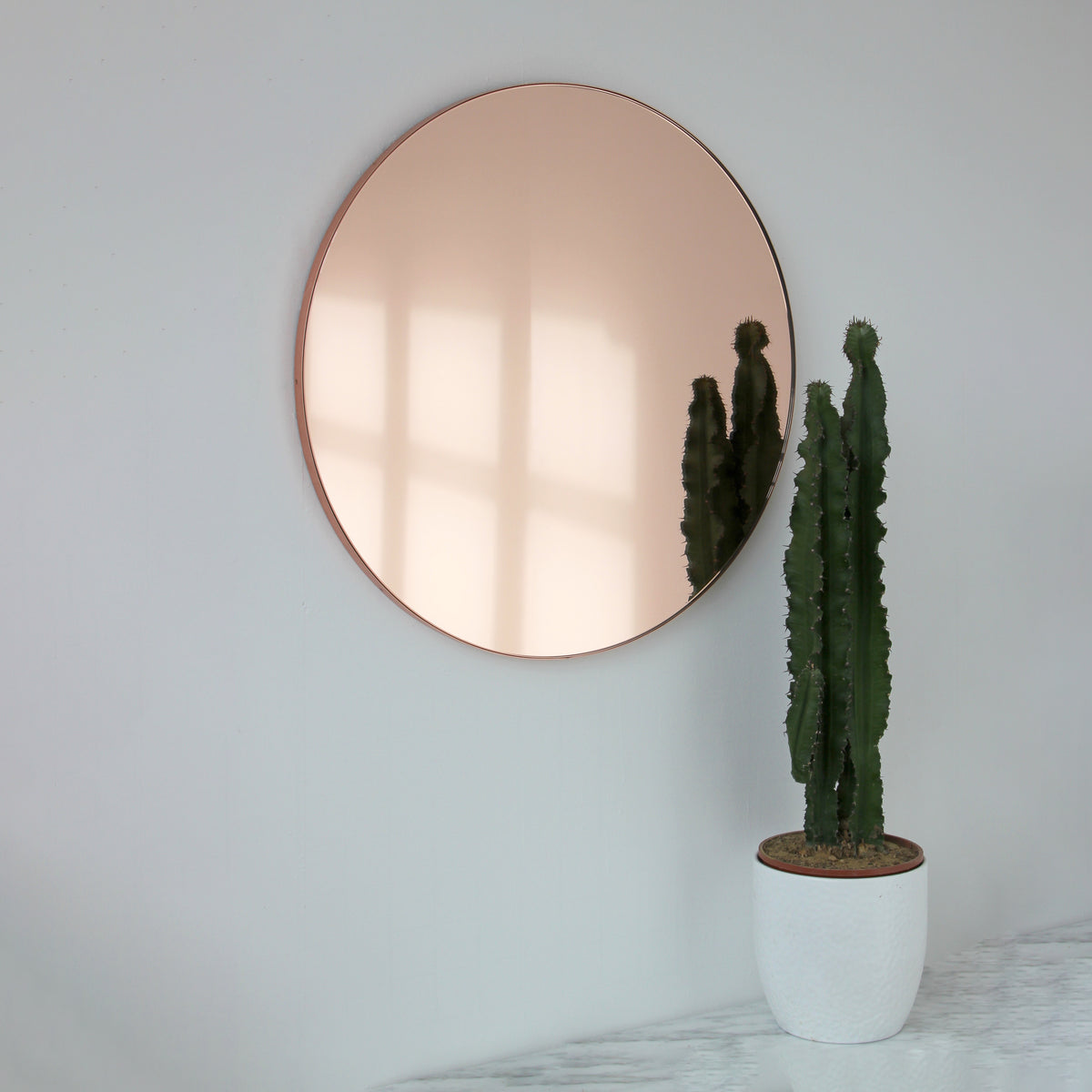 Orbis™ Rose gold Tinted Modern Round Mirror with a Copper Frame