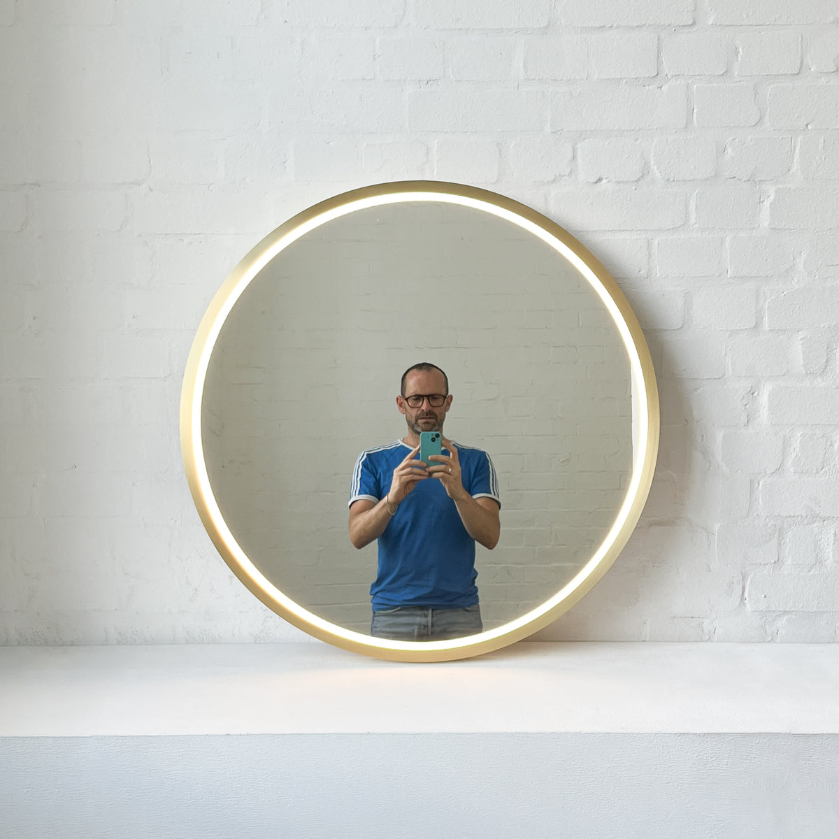 Front Illuminated Orbis™ Round Mirror with Handcrafted Brass Full Frame