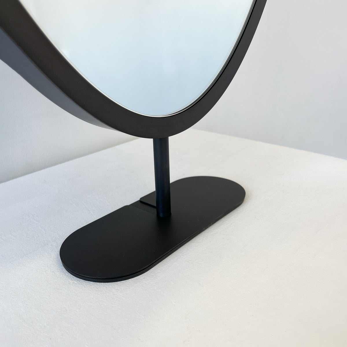 Countertop Oval Mirror with Contemporary Bronze Patina Frame