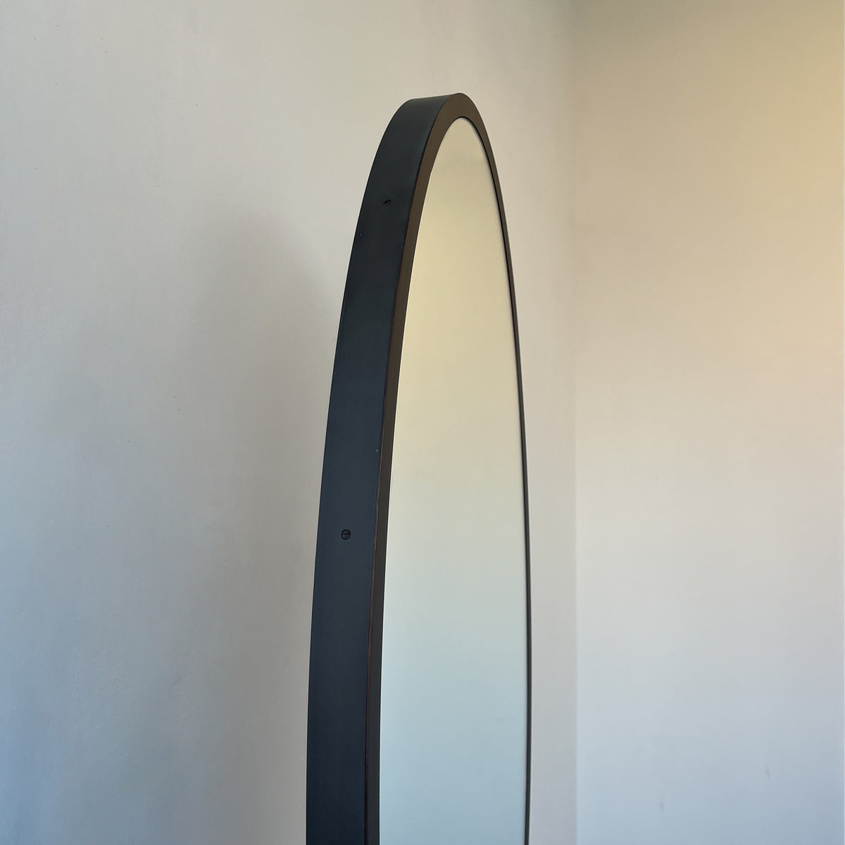 Countertop Oval Mirror with Contemporary Bronze Patina Frame