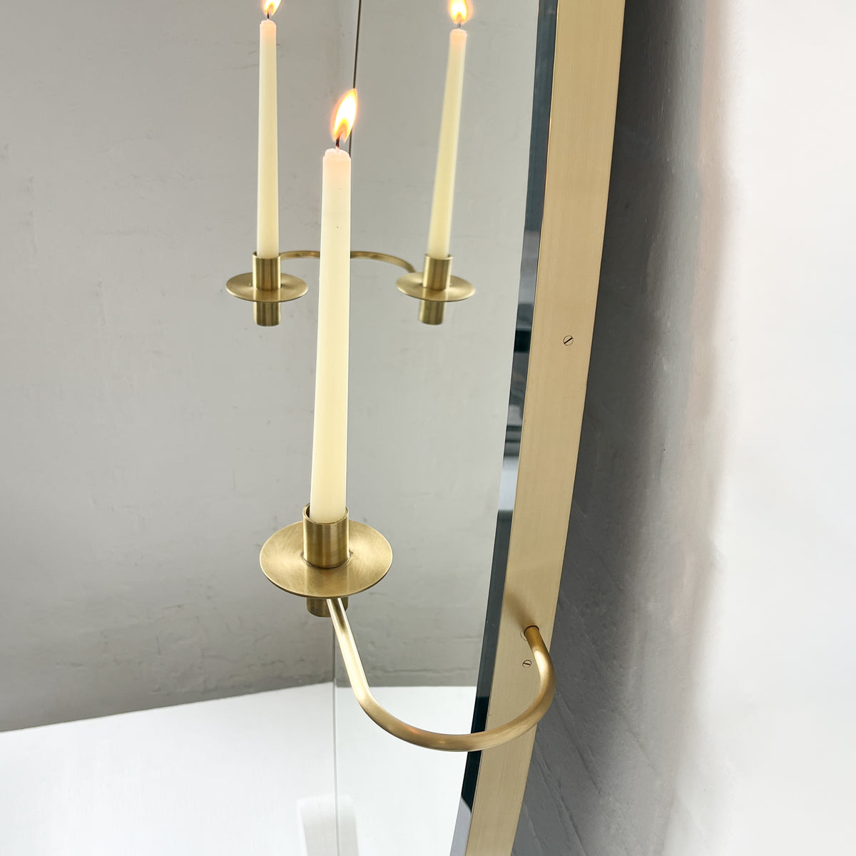 Ovalis™ Oval-Shaped Bevelled Mirror with Decorative Candleholders and Brushed Brass Frame