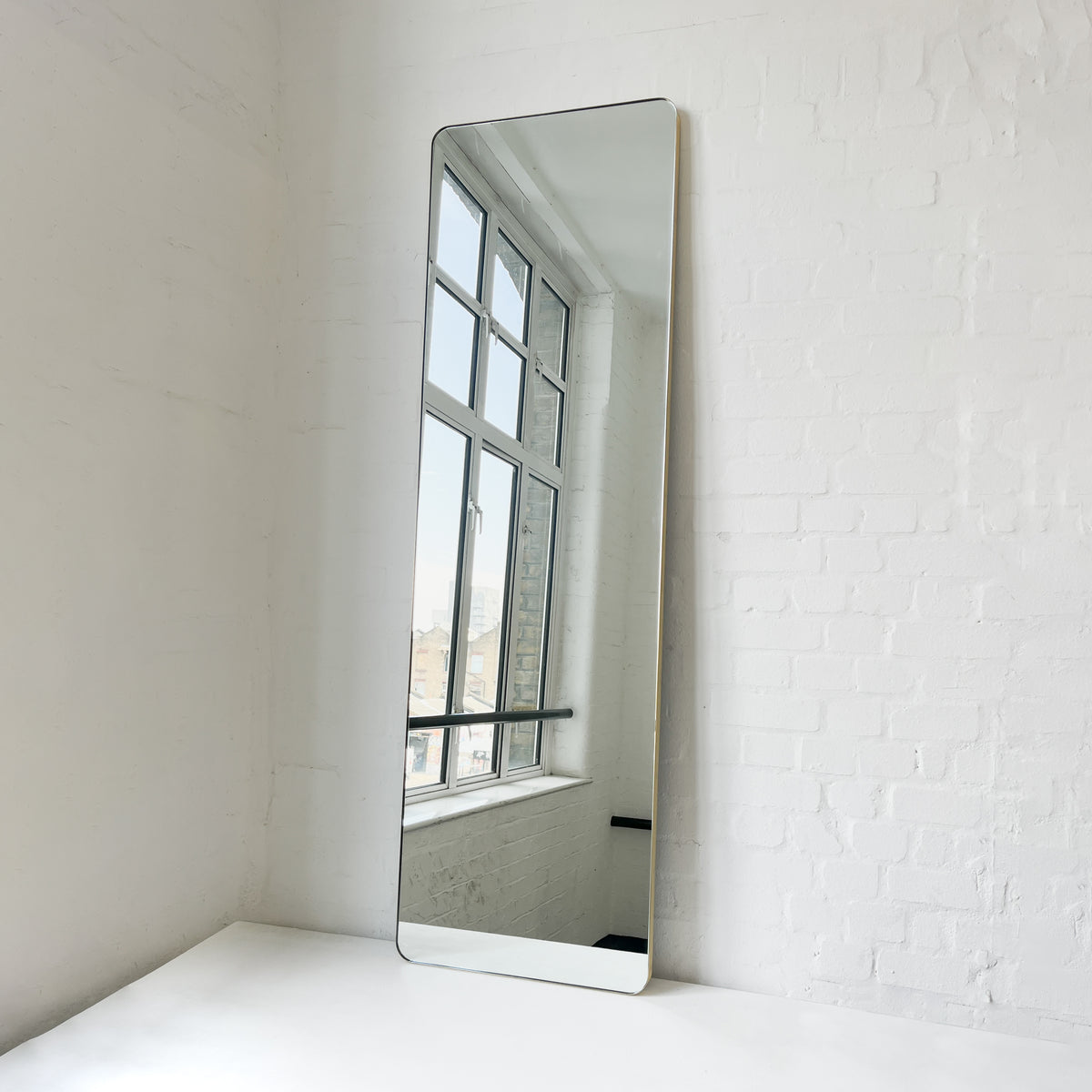 In Stock Oversized Quadris™ Wall leaning and Wall Hanging Rectangular Mirror, Brass Frame
