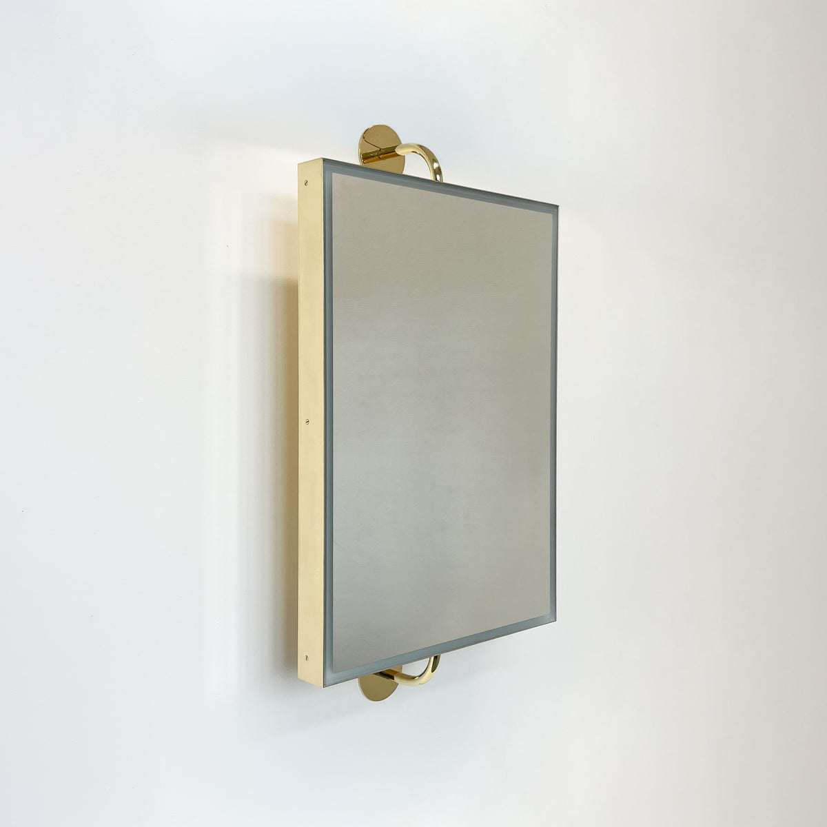 Illuminated Vorso™ Wall Attached Rotating Rectangular Mirror with Polished Brass Frame