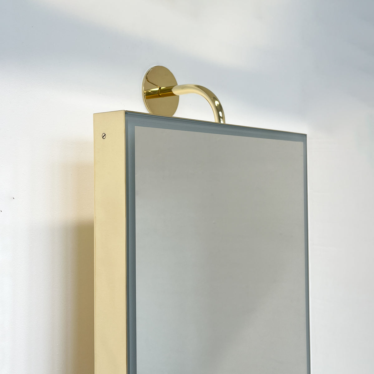Illuminated Vorso™ Wall Attached Rotating Rectangular Mirror with Polished Brass Frame