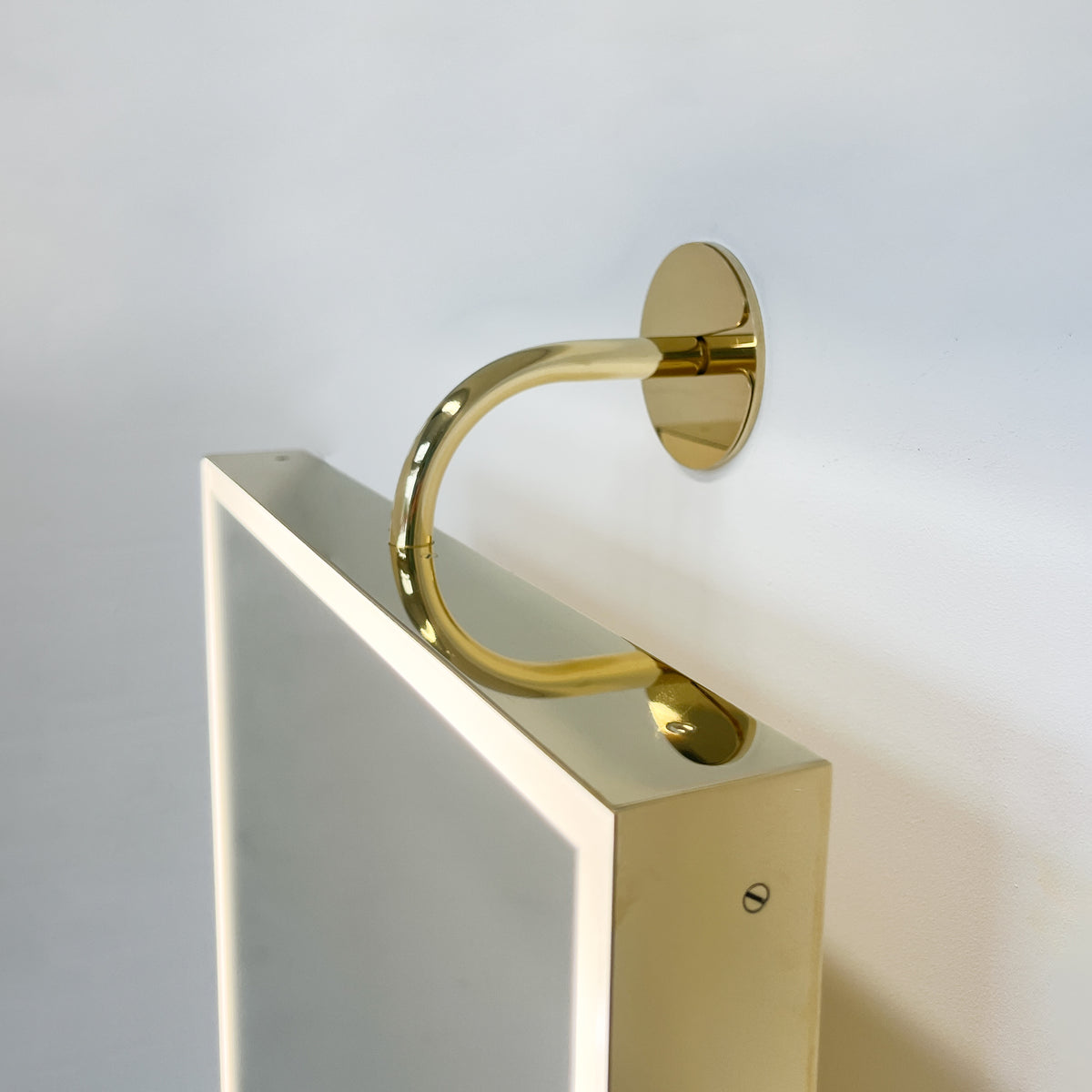 Illuminated Vorso™ Wall Attached Rotating Rectangular Mirror with Polished Brass Frame