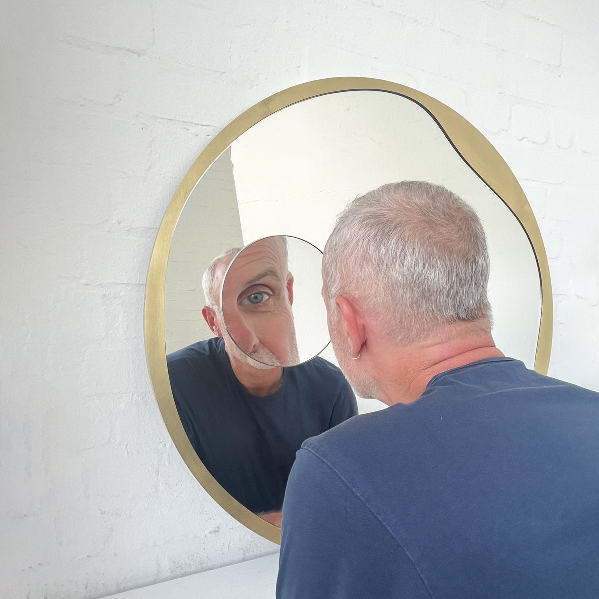 Round Mirror with Integrated Magnifying Mirror and Decorative Brass Full Frame