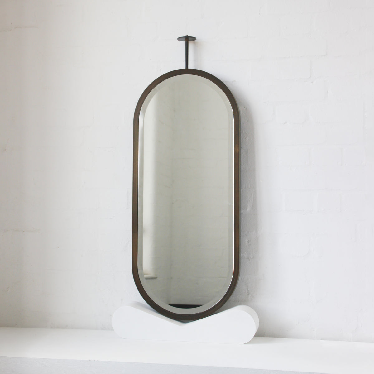 Pill shaped Ceiling Suspended Bevelled Mirror with Brass Full Frame