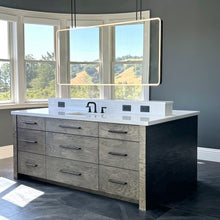 Oversized modern ceiling suspended Quadris™ front illuminated rectangular double sided mirror with a handcrafted blackened metal frame
