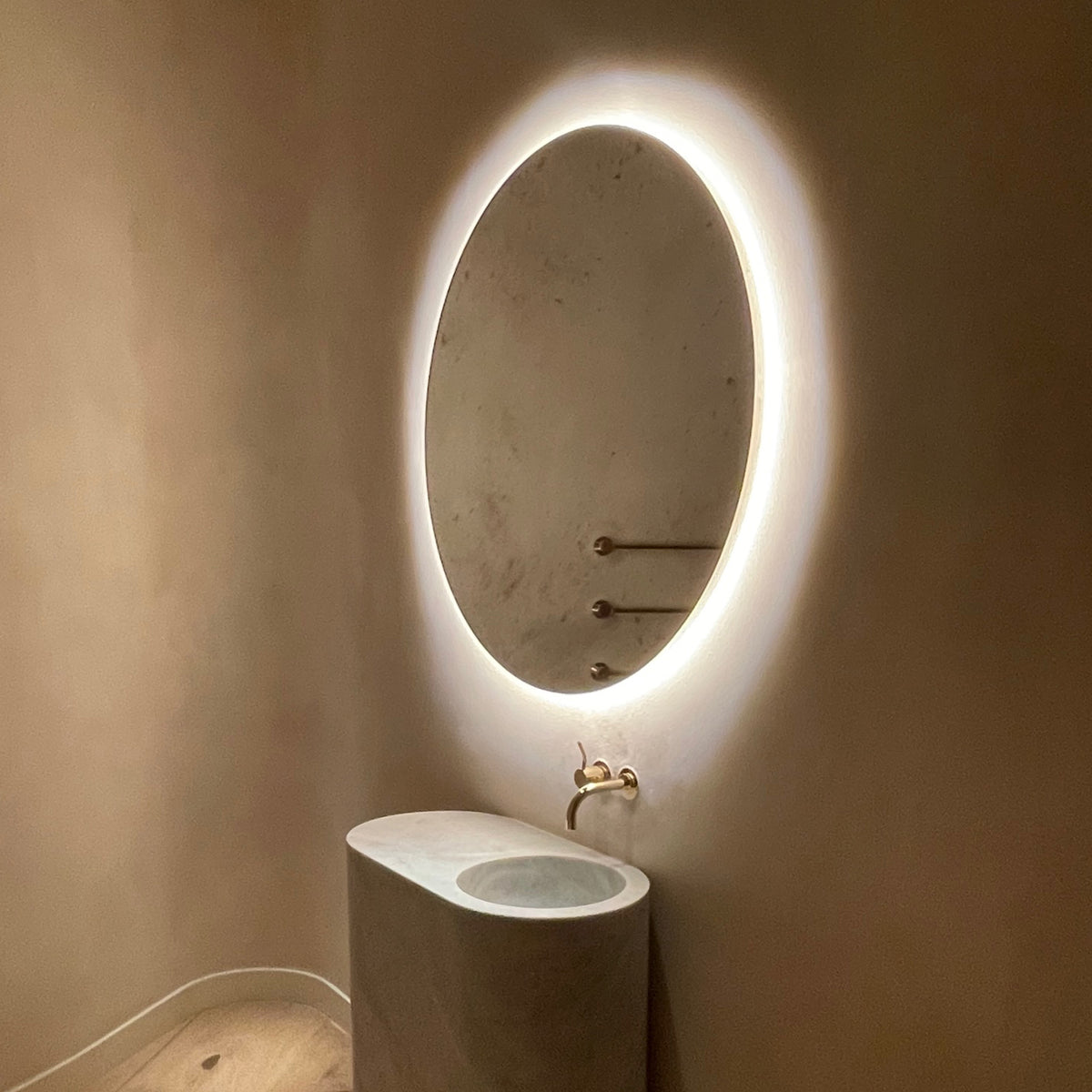 Orbis™ Illuminated Contemporary Round Mirror with a Brass Frame
