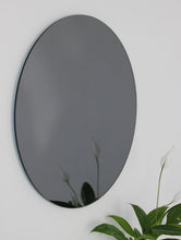 Orbis™ Contemporary Black Tinted Round Frameless Mirror