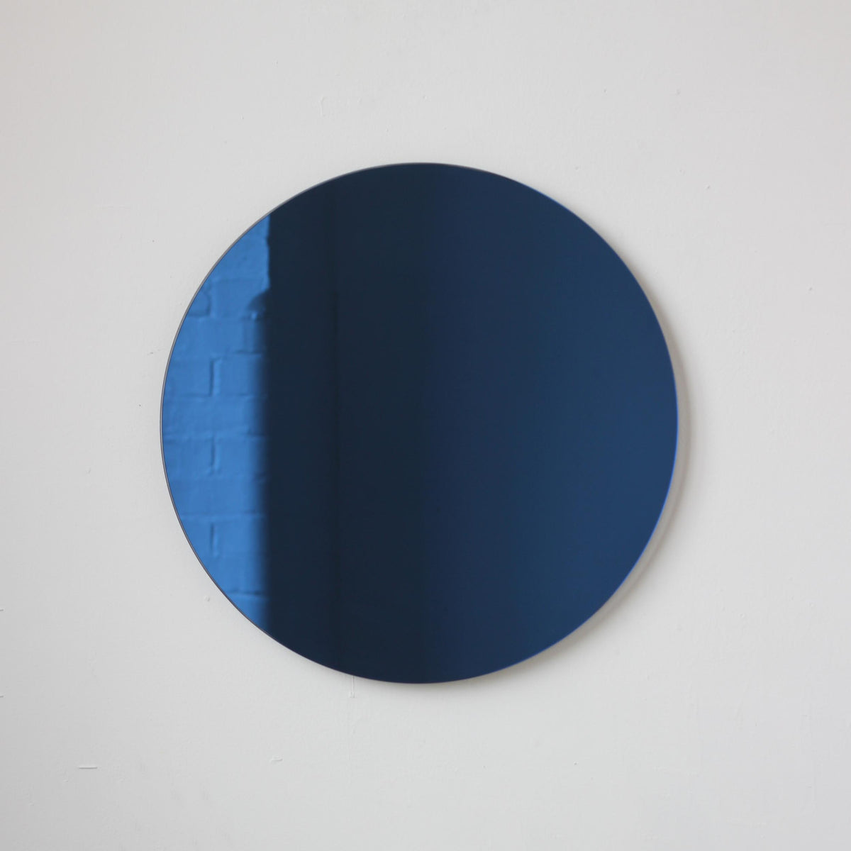 Orbis™ Contemporary Black Tinted Round Frameless Mirror