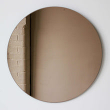 Orbis™ Contemporary Black Tinted Round Frameless Mirror