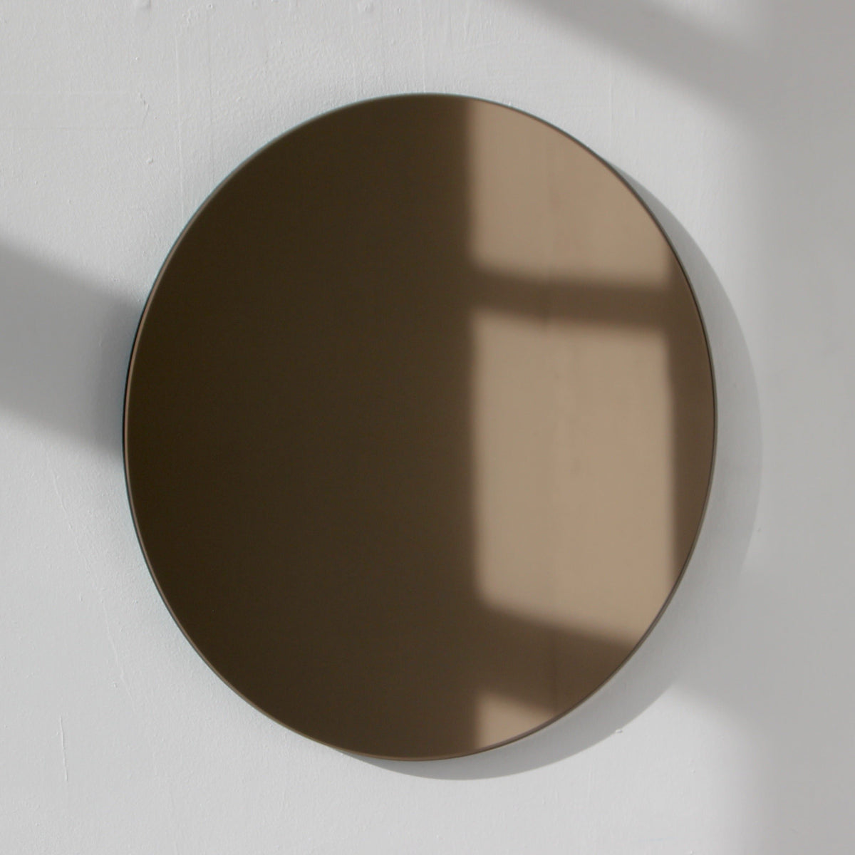 Orbis™ Bronze Tinted Round Minimalist Frameless Mirror