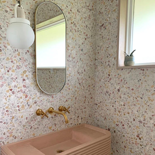 Capsula™ Capsule shaped Modern Mirror with an Elegant Brass Frame