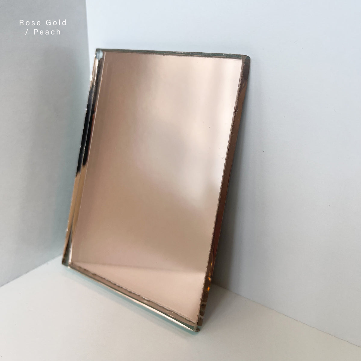 Capsula™ Capsule shaped Rose Gold Contemporary Mirror with a Copper Frame