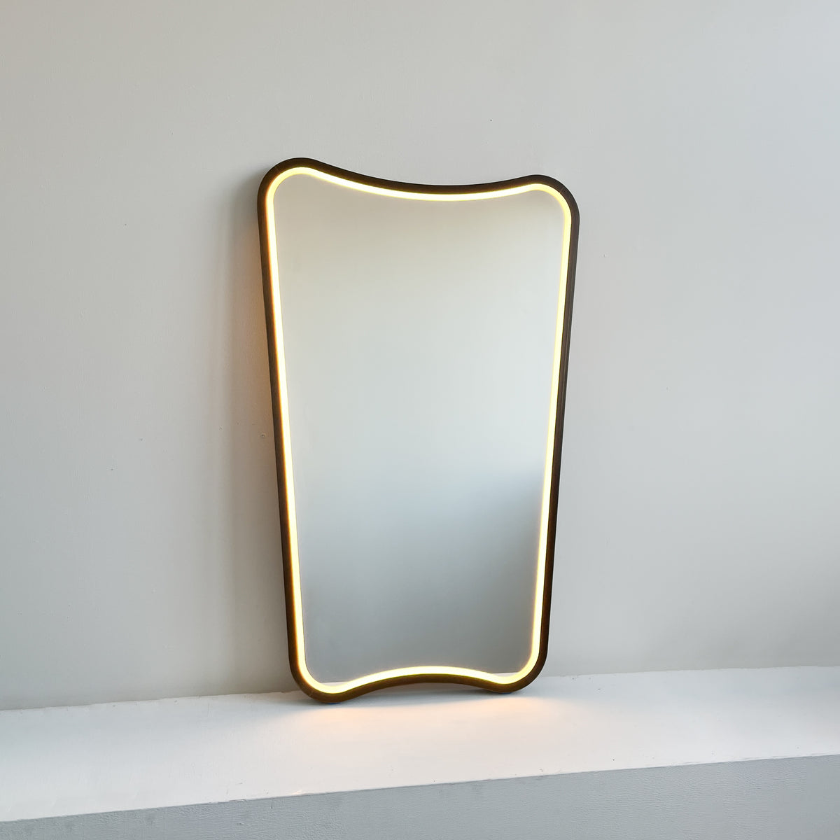 Mid-century inspired Wall Mirror with Front Illumination and Bronze Patina Frame