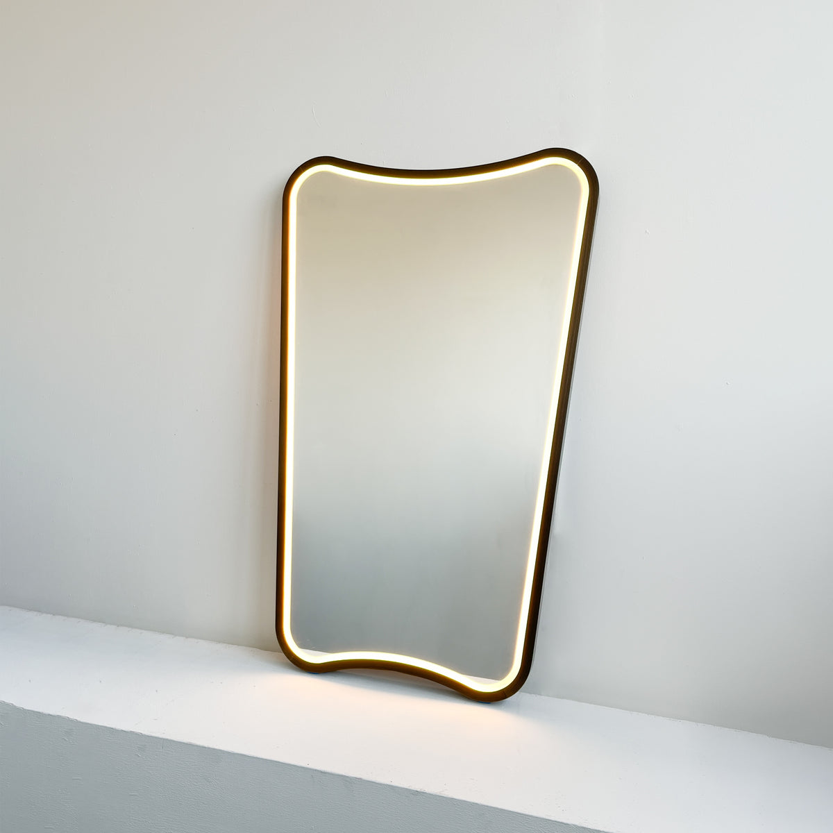 Mid-century inspired Wall Mirror with Front Illumination and Bronze Patina Frame