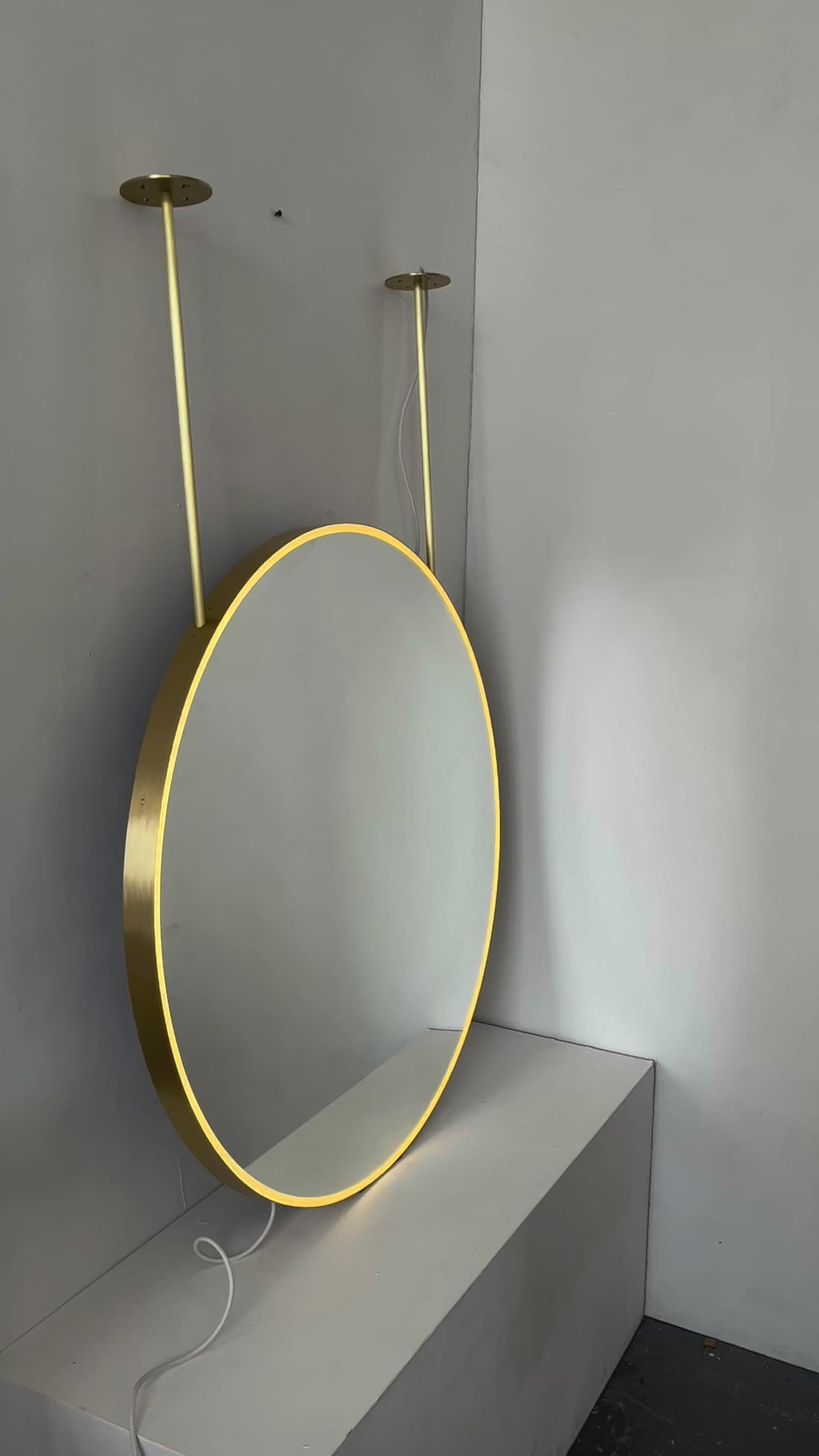 Orbis™ Illuminated Ceiling Suspended Round Mirror with Brushed Brass Frame, Two Arms