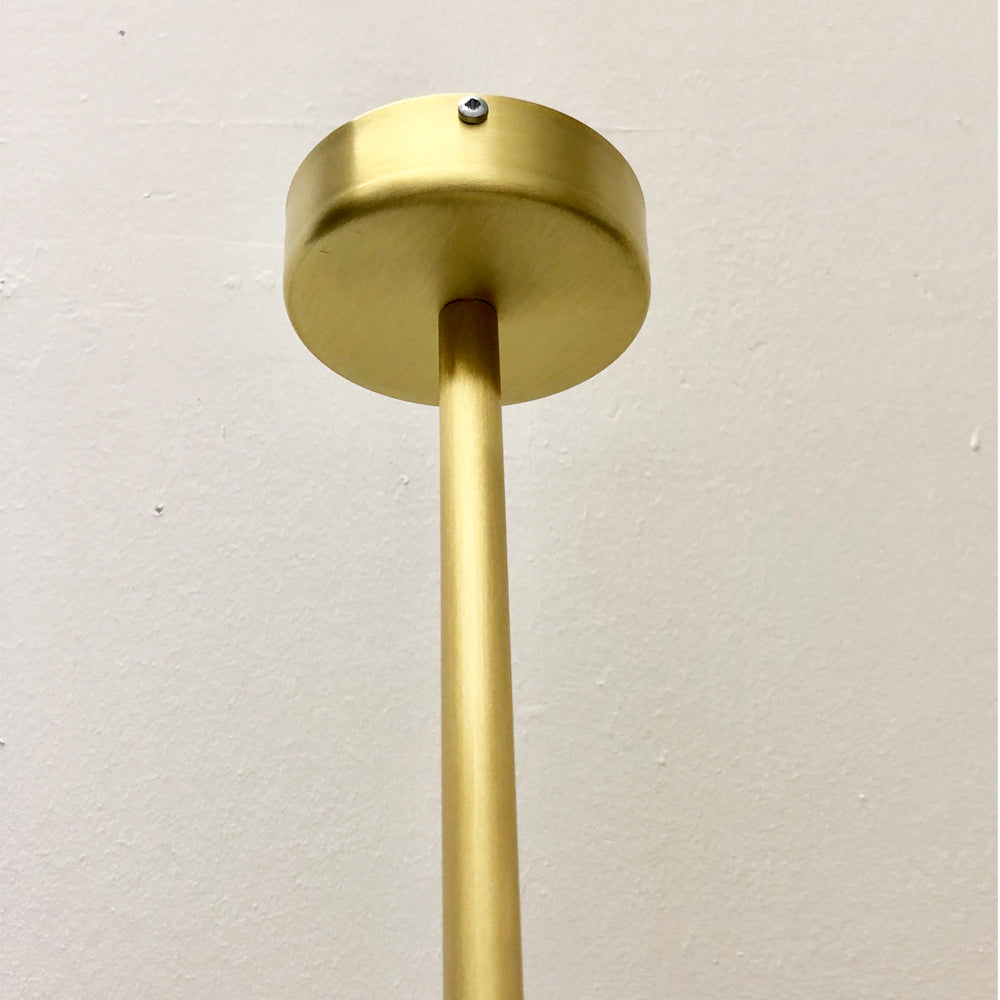 Capsula™ Suspended Capsule shaped Bathroom Mirror with a Brushed Brass Frame
