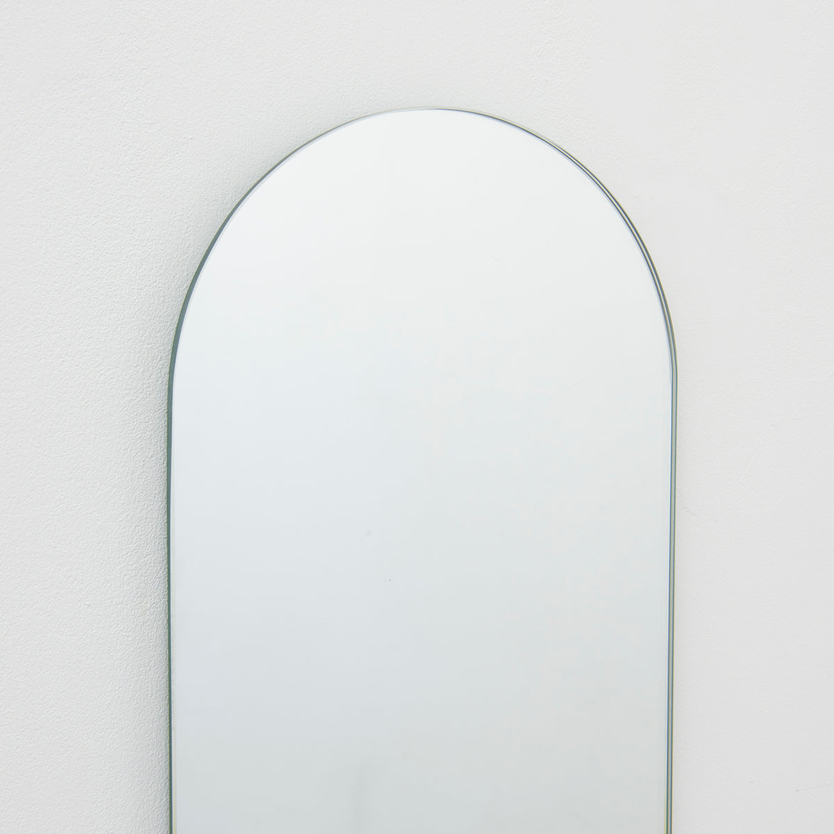 Arcus™ Arched Minimalist Frameless Mirror with a Floating Effect