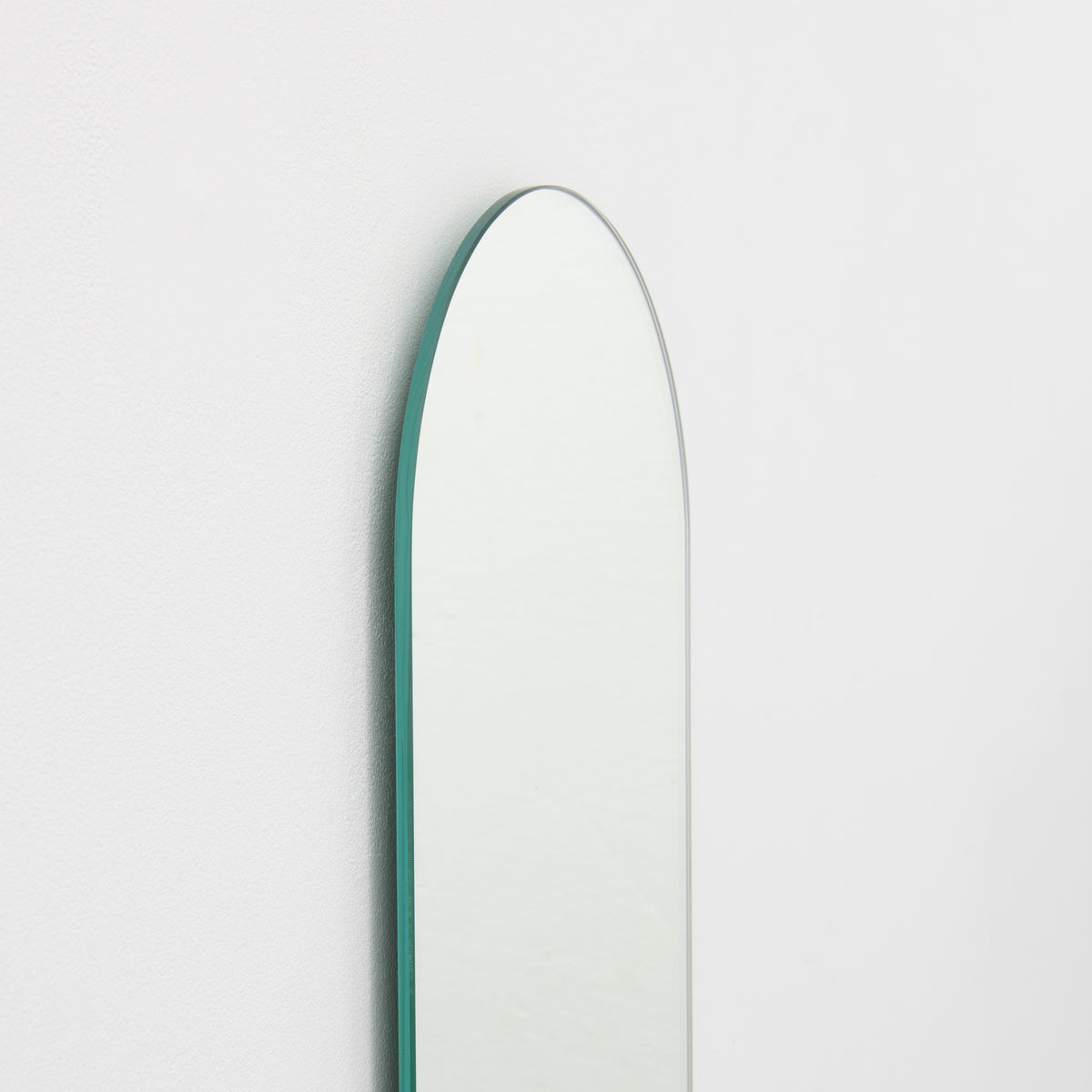 Arcus™ Arched Bronze Tinted Minimalist Frameless Mirror with a Floating Effect