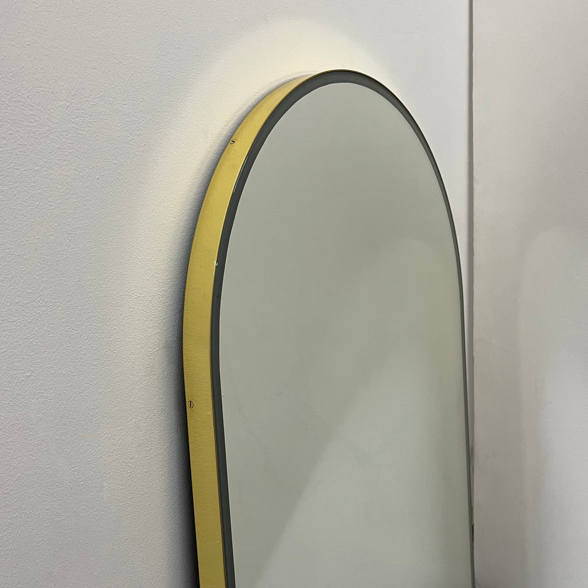 Arcus™ Front Illuminated Arched Contemporary Mirror with a Brass Frame