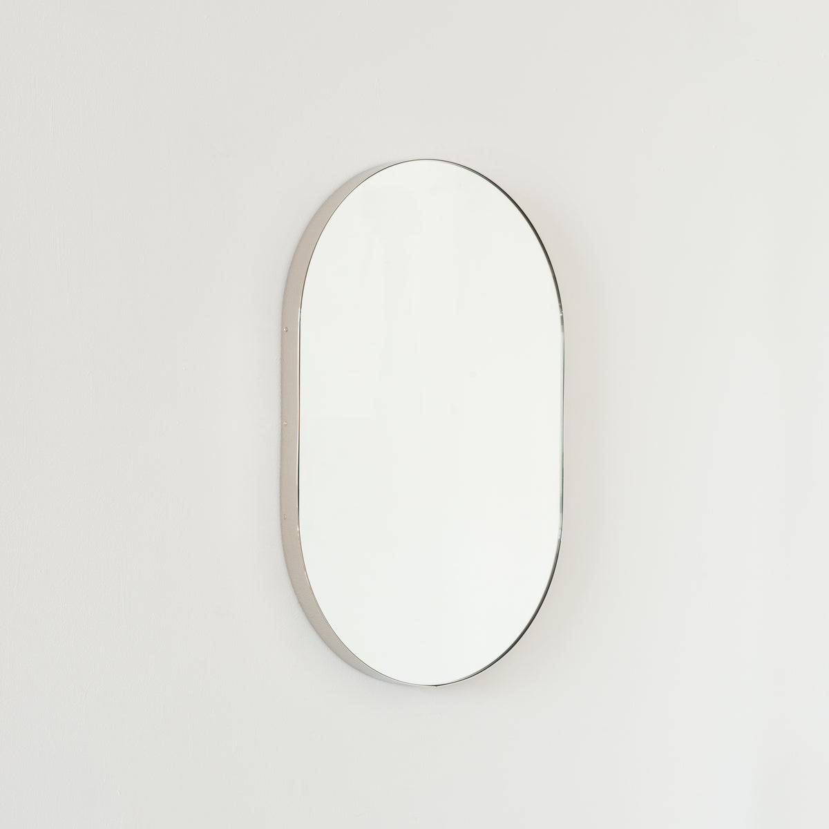Capsula™ Capsule shaped Mirror with Modern Nickel Plated Frame, Customisable