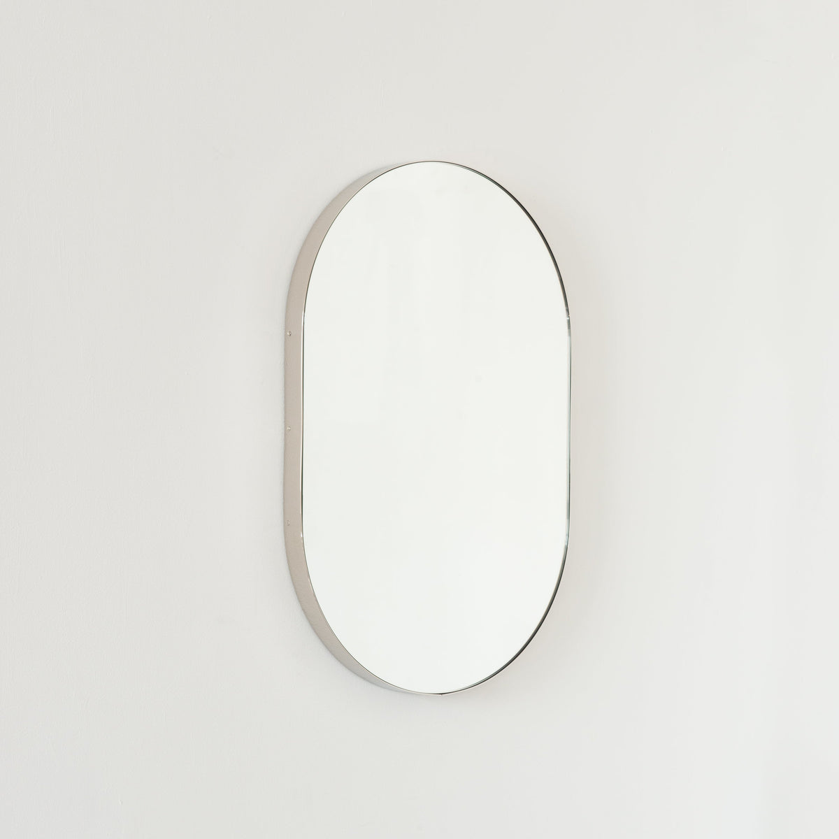 In Stock Capsula Pill shaped Mirror with Modern Nickel Plated Frame
