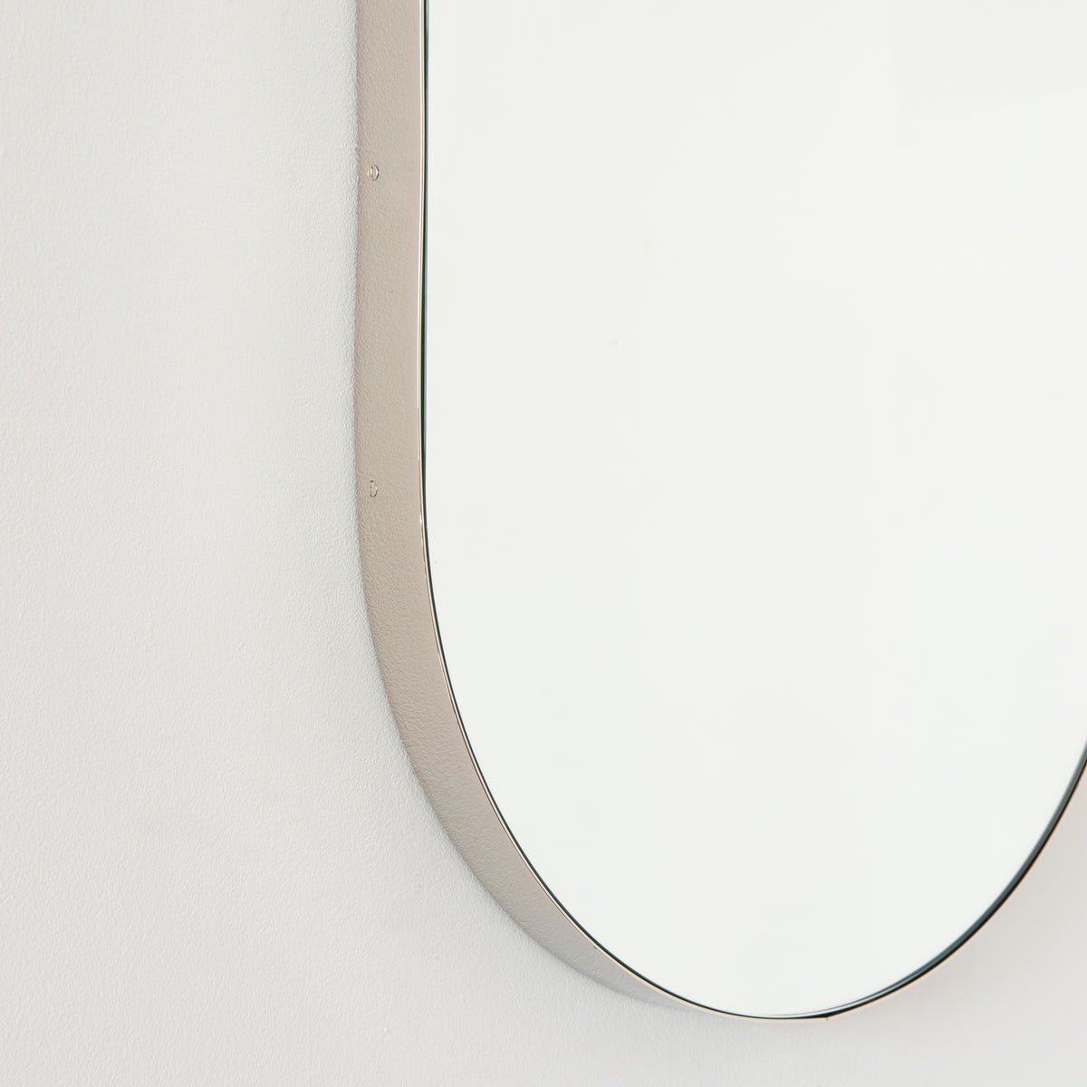 Capsula™ Capsule shaped Mirror with Modern Nickel Plated Frame, Customisable