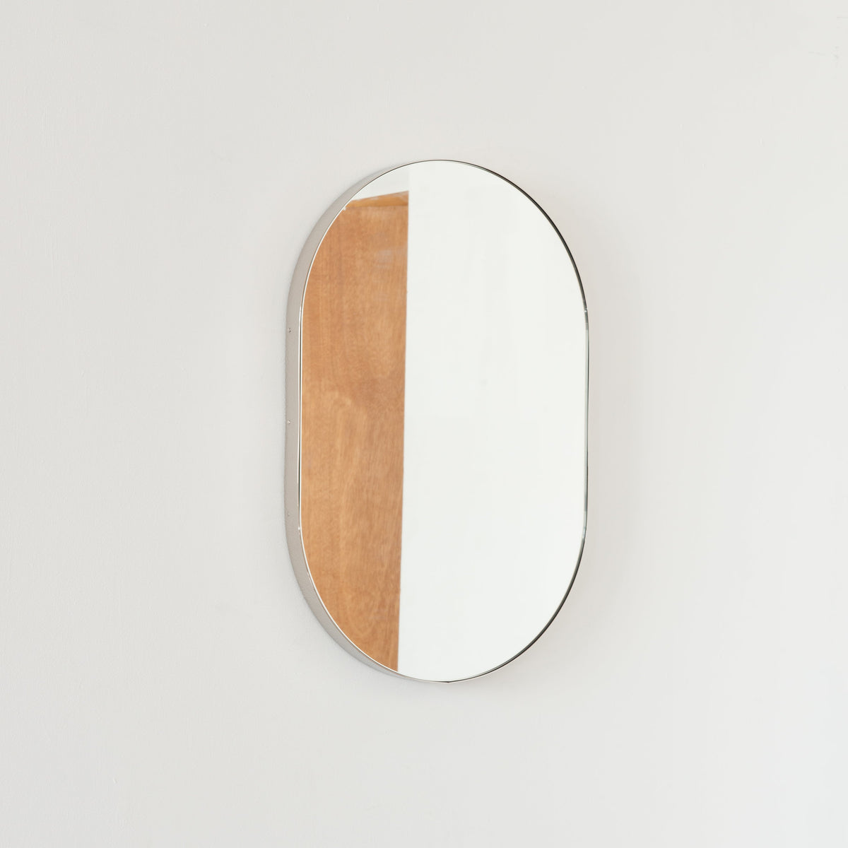 In Stock Capsula Pill shaped Mirror with Modern Nickel Plated Frame
